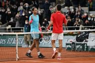 Rafael Nadal (L) and Novak Djokovic pictured at the 2020 French Open